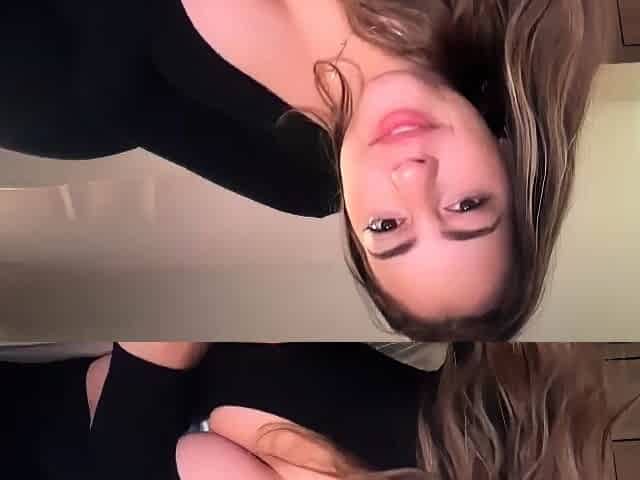 Hot babe with big boobs playing with her lactating boobs