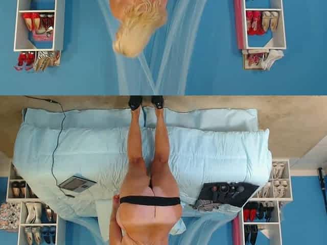 Blonde mature with big boobs masturbates in bed
