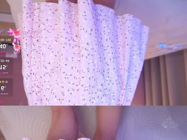 Your Mia in a Summer Dress on the Bed with a Dildo