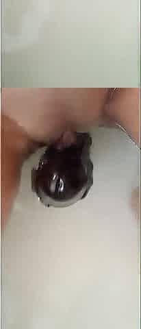 I play with a wonderful ebony sex-toy, I rub it well on my love button and then I put it inside my vagina