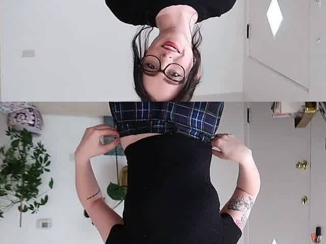 Small titted brunette Sharron with glasses masturbates