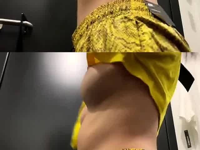 Risky public sex in the fitting room of a fitness store