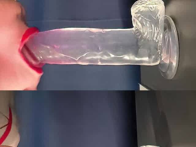 Oral sex on a sextoy with red lipstick