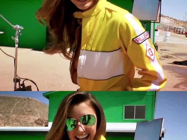Big tits MILF posing behind the scenes