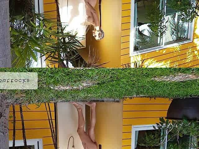 Charming woman takes outdoor shower and masturbates by the pool