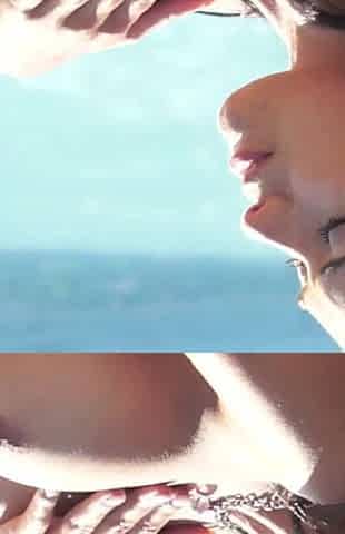 Two hot brunettes rubbing and licking