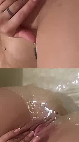 Water masturbation in a full washroom, I cum right into the water and proceed fingering