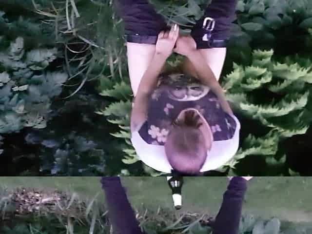 pissing and screwing a bottle in the park