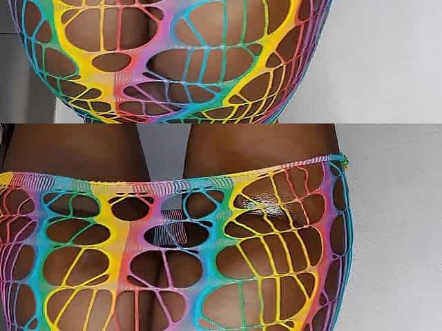 Large black mother i'd like to fuck shows bug oiled booty in rainbow underware