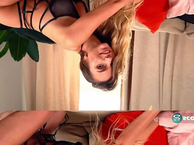 Lingerie-wearing brunette bombshell Sandra strips nude and plays with her wet pussy.