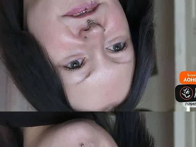 Tattooed brown-haired with nose ring loves erotic solo play
