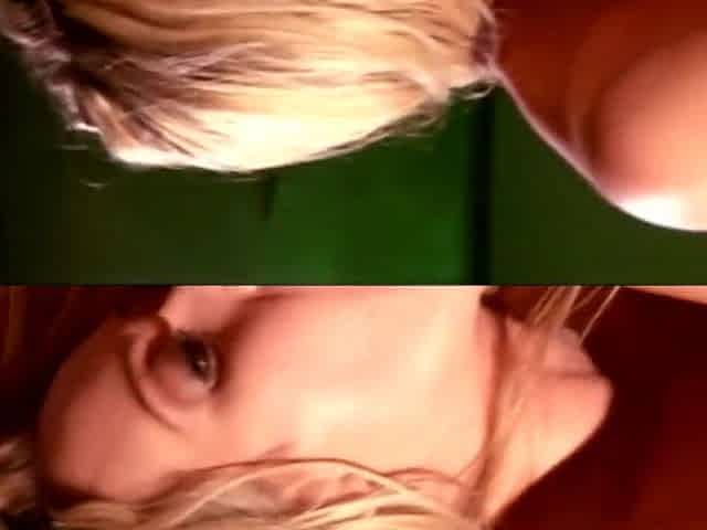 2 voluptuous golden-haired honeys are confined in a room and engaged in vigorous raunchy activity.
