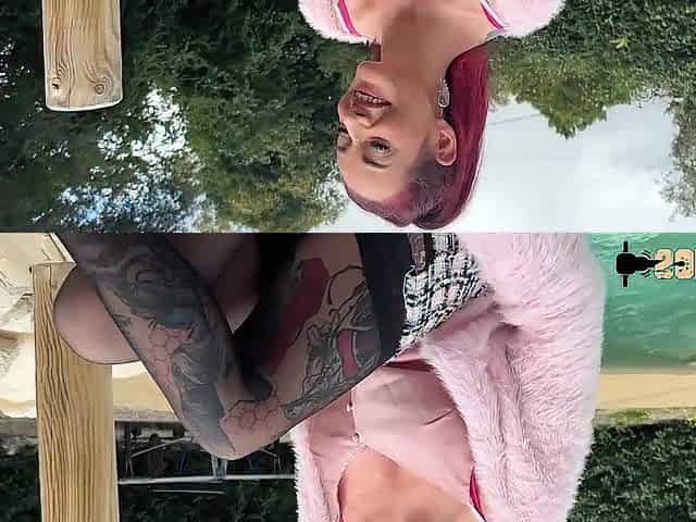 Flaming redhead Sally has fun with two huge cocks