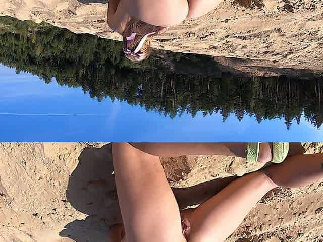 Undressed beauty walks in a sand quarry