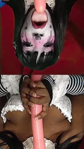 Black clown plays around