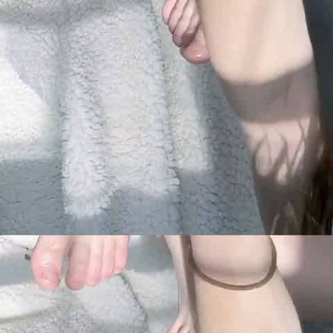 Brunette with foot fetish rubs big dick with her feet in POV