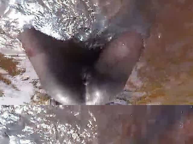 Slender tribe gal with a body full of mud exposed outdoor