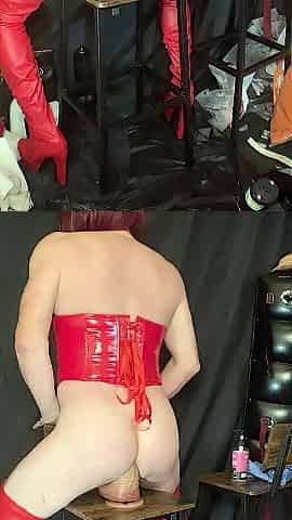 Red corset and haunch-high boots and giant