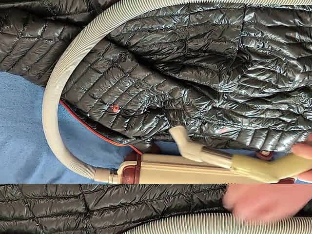 Vacuuming Darksome Shark Ghost Whisperer Down Jacket with Vintage Electrolux Vacuum Cleaner