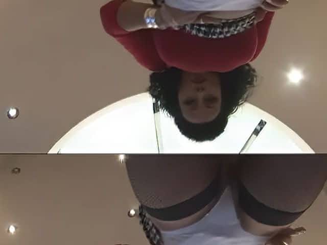 Big tits mature in mini skirt