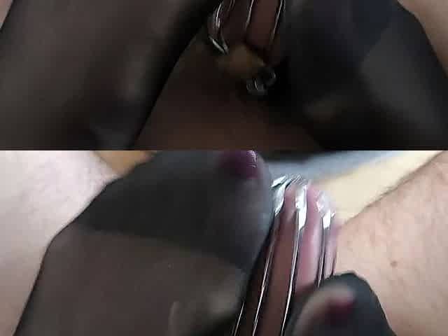Headmistress ignoring thrall beneath desk and playing wih dick in chastity cage