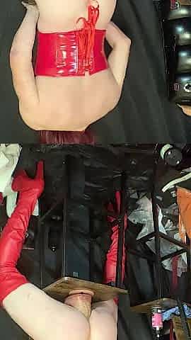 Red corset and haunch-high boots and massive