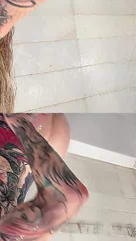 Joanna Hotty shaves her inked cunt in the shower
