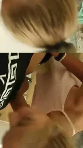 on her knees in bathroom