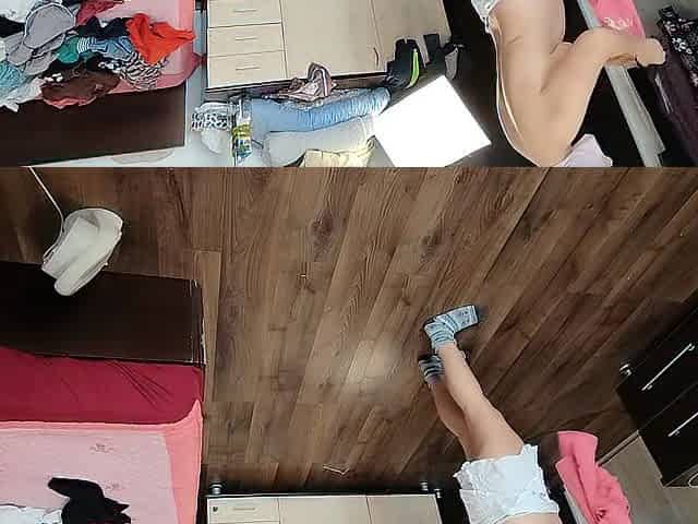 Moglie amatoriale che si diverte a provare vestiti che poi taglia.