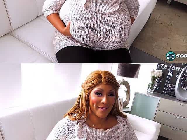 Africa Sexxx shows off her giant tits and gets off