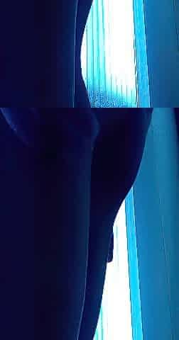 Tanning his butt and his gap