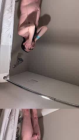 Coarse hand meets dong below steamy shower