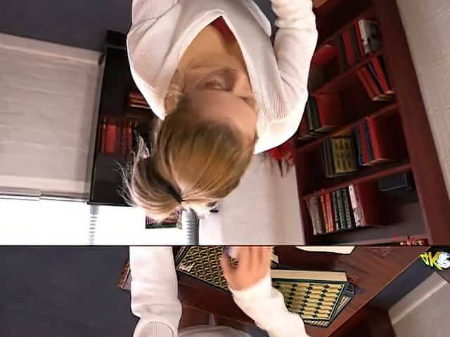 Young secretary Jayne shows off her yummy tits and perky nipples