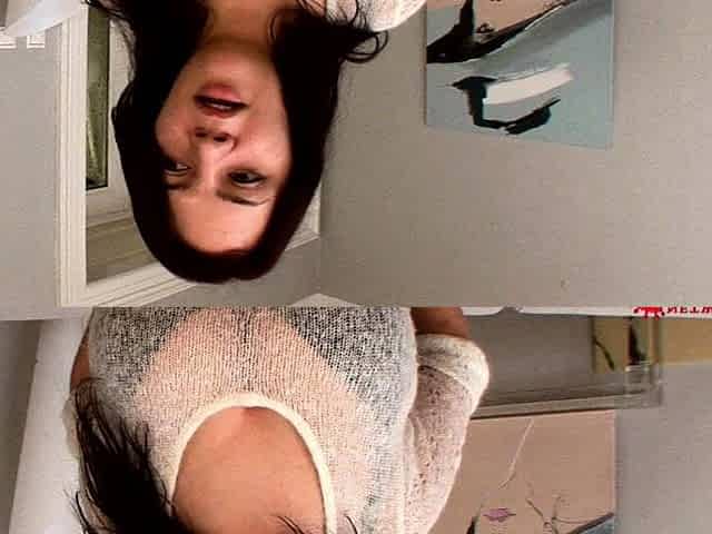 Busty curly brunette with big boobs fucks on couch