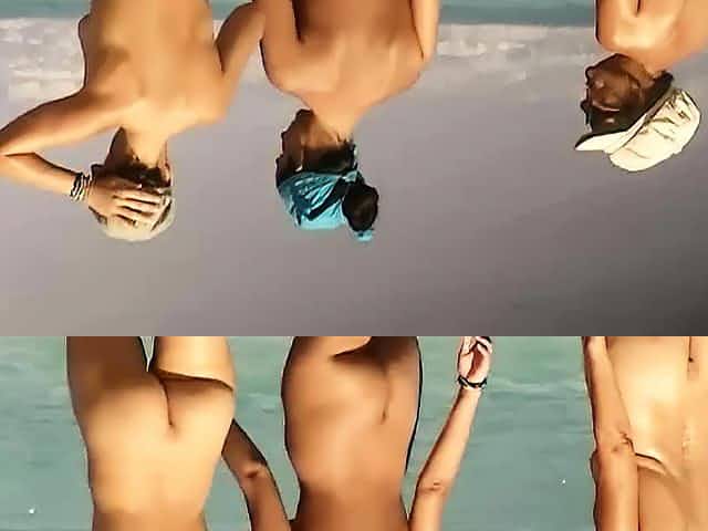 Naked teen nudist lets the water kiss her body