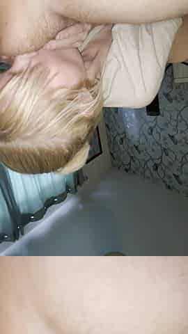 Blonde girlfriend giving a blowjob