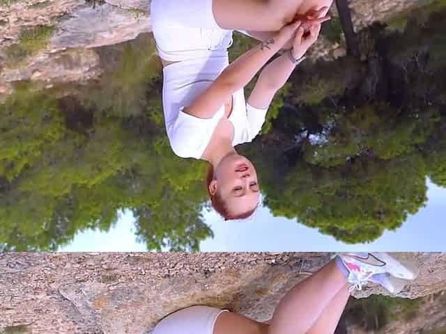 Tattooed redhead likes solo masturbation in nature