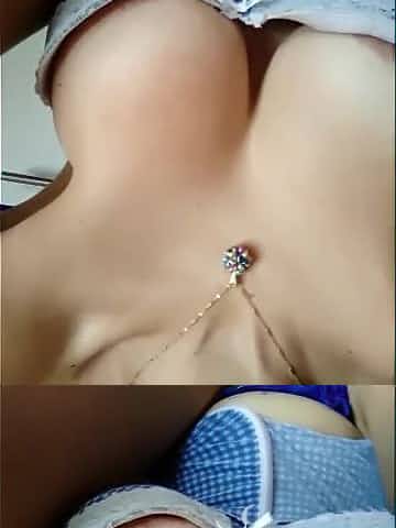 oriental youthful with large breasts screws vagina with sex tool