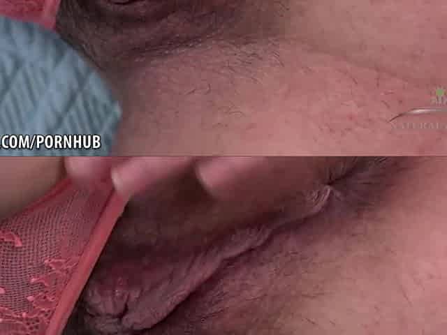Curvy unshaved blond using a toy to cum on the bed