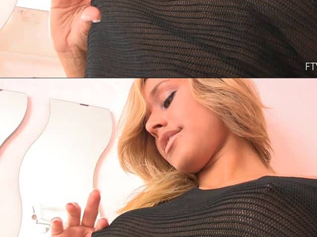 Lovely Kennedy lifts a dress up and rides a large dildo