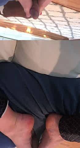 Brunette with foot fetish rubs big dick with her feet in POV