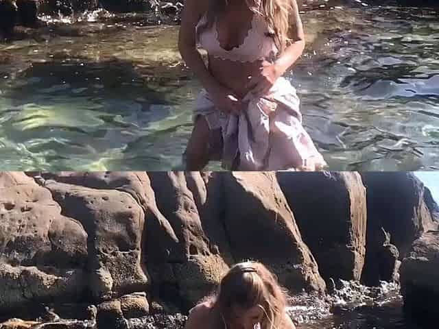 MILF blonde masturbates on the bed
