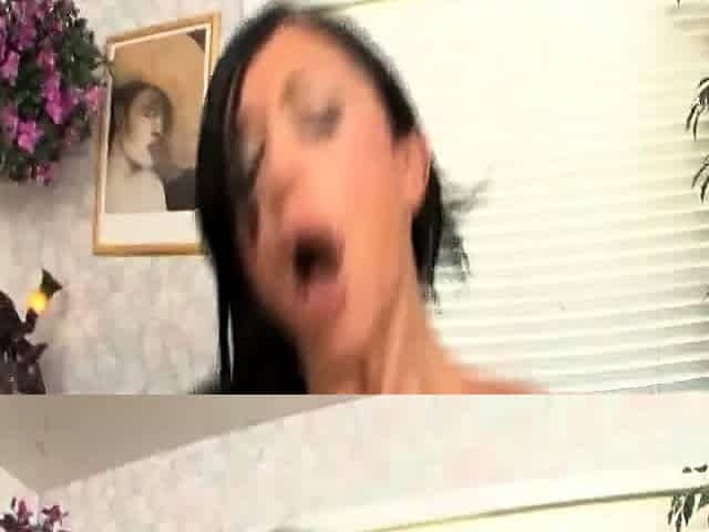 Brunette seductress working her big boobs and hot ass