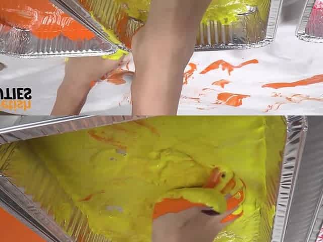 Brunette Diva Coats Her Feet and Hands with Paint to Create an Award-winning Art