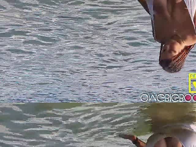 bushy nudist swimming