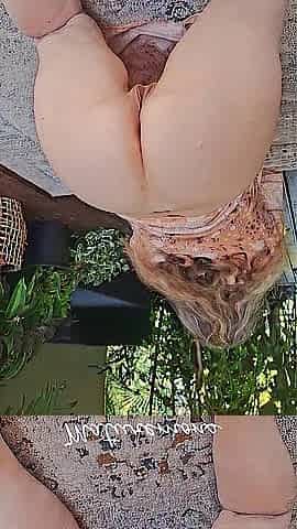 Lustful aged on all fours widening her butt cheeks and displays her anus and gaping vagina