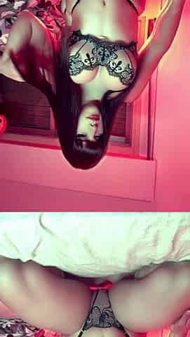 Femboy in lingerie with big boobs poses for the camera