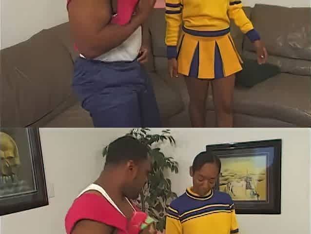 Hot black cheerleader screws fan in the living room