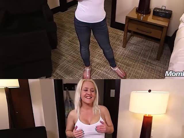 Busty blonde with a pretty smile is spreading her ass cheeks and getting fucked from the back