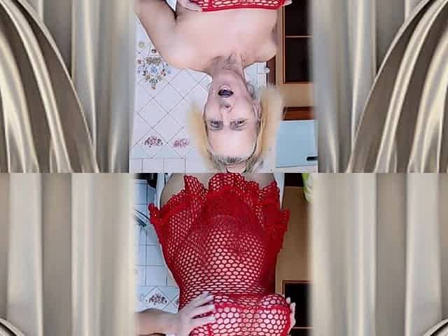 Hot Housewife Lukerya in a Red Mesh Dress Flirts and Makes Coffee in the Kitchen.